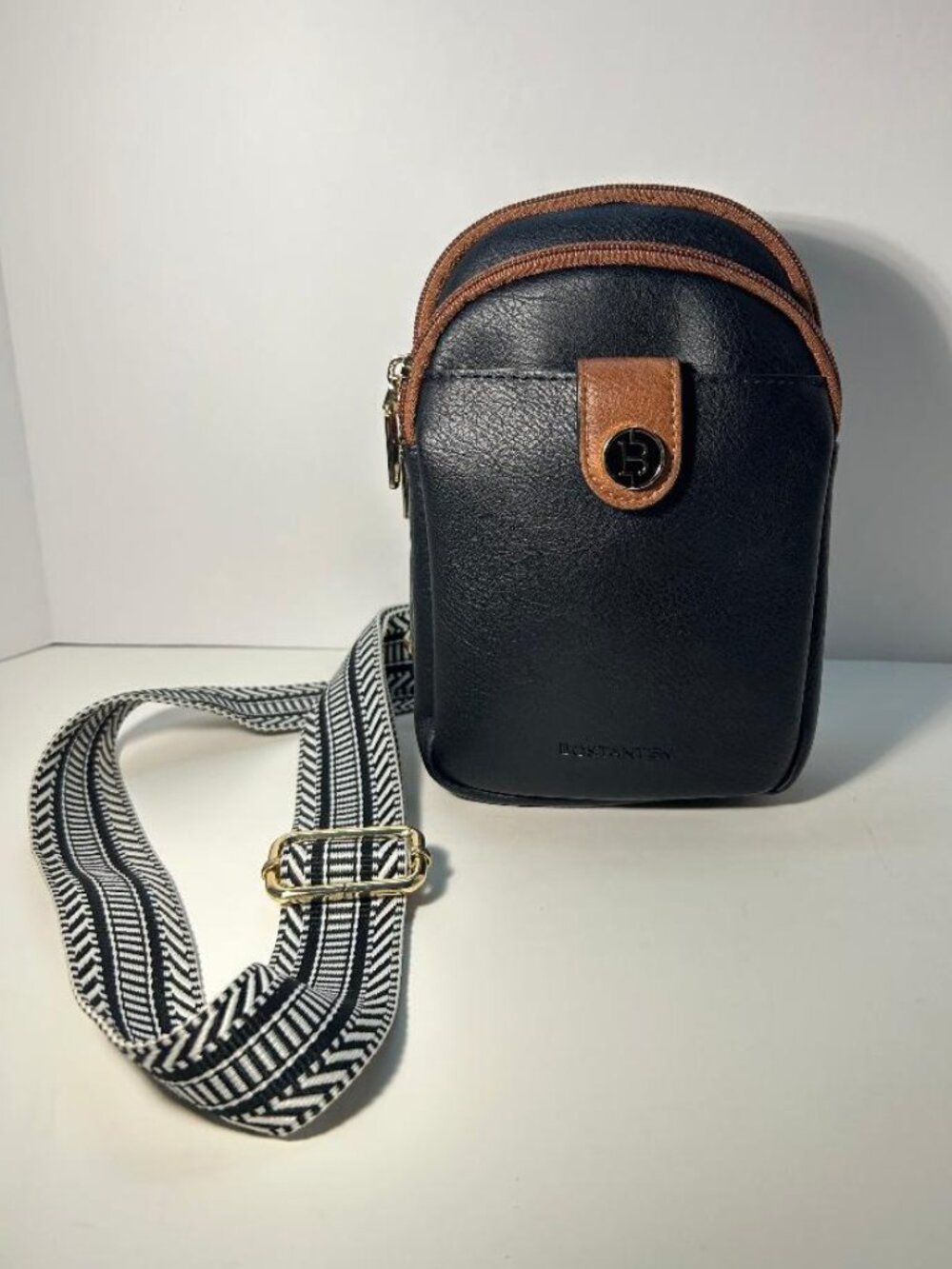 Black Bostanten Arrio Reversible Strap Sling Bag